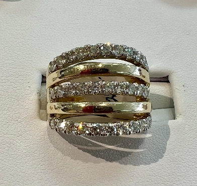 10K yellow and white gold; diamond band.
33 fancy cut diamonds: 1.50 carat total weight
Canadian Certified Gold 10K yellow and white gold; diamond band.
33 fancy cut diamonds: 1.50 carat total weight
Canadian Certified Gold